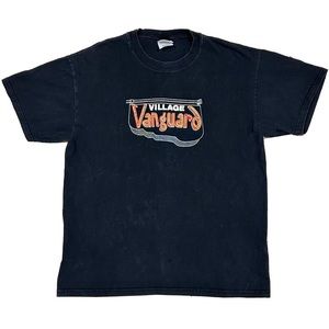 Vintage Village Vanguard graphic t-shirt on a deep black Hanes base.